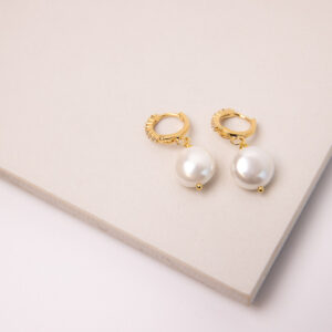 Enhance any look with the unique style of these Hoops Gold Filled 18K with Micro Zirconias and Natural Pearl earrings.