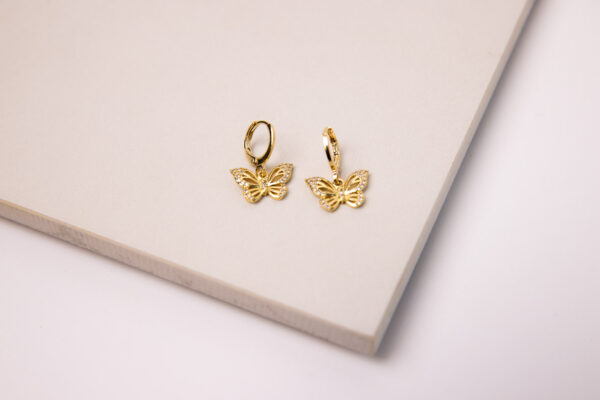 These finely crafted 18K Gold Filled Earrings with Micro Zirconias make a stunning addition to any jewelry collection.